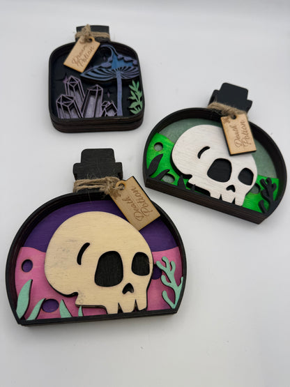Handmade Gothic Skull & Potion Bottle Wooden Decorations – Layered Laser Cut Art